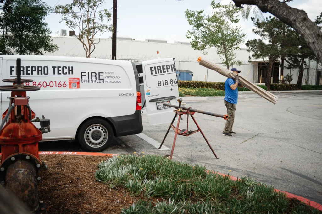 thechnician installs draining sprinkler system