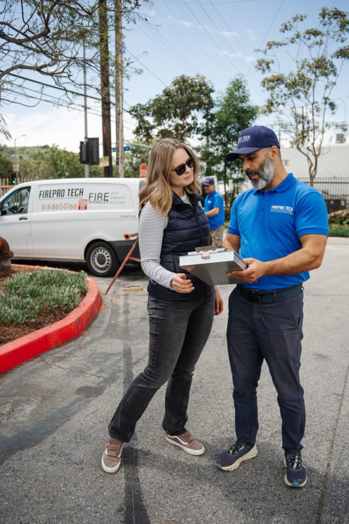 A professional show the results of meeting Fire Sprinkler System Inspection Requirements